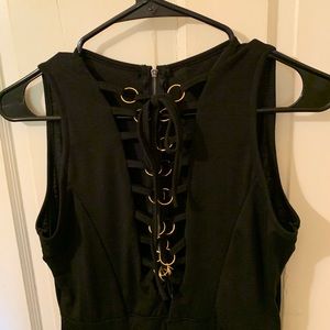 Sexy black dress with lace up front.